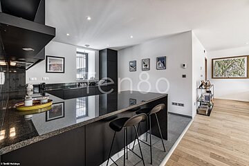 A kitchen with the number 80 on the wall