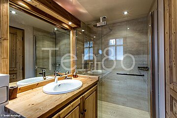 A bathroom with the number 80 on the wall