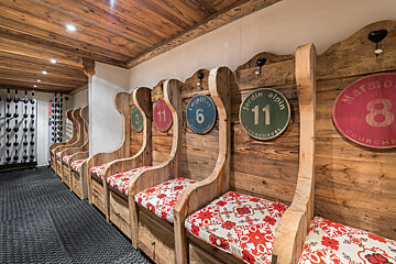 A wooden bench with the number 11 on it