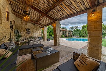 A patio with a pillow that says imported cacao on it