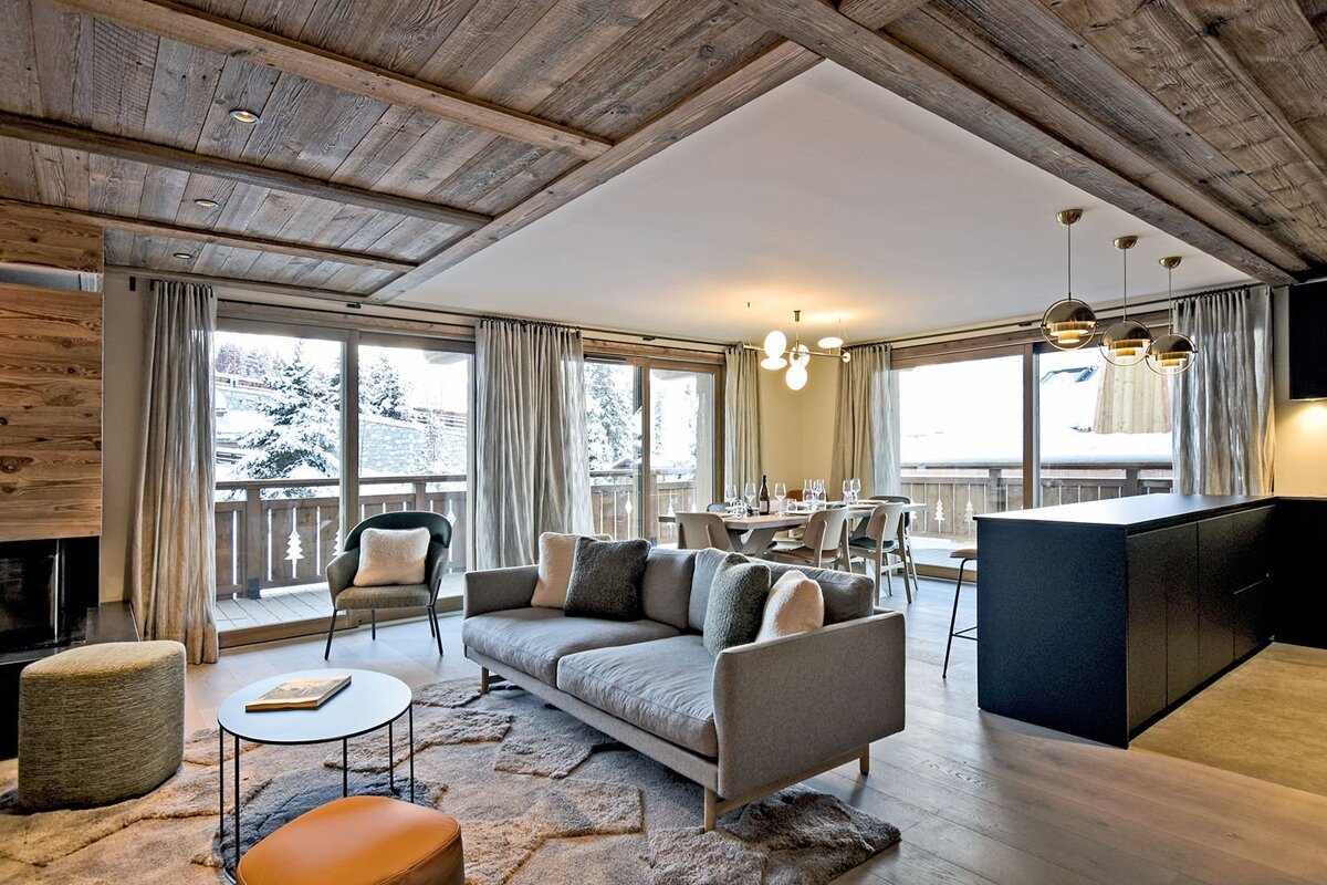 A living room with a couch and a table