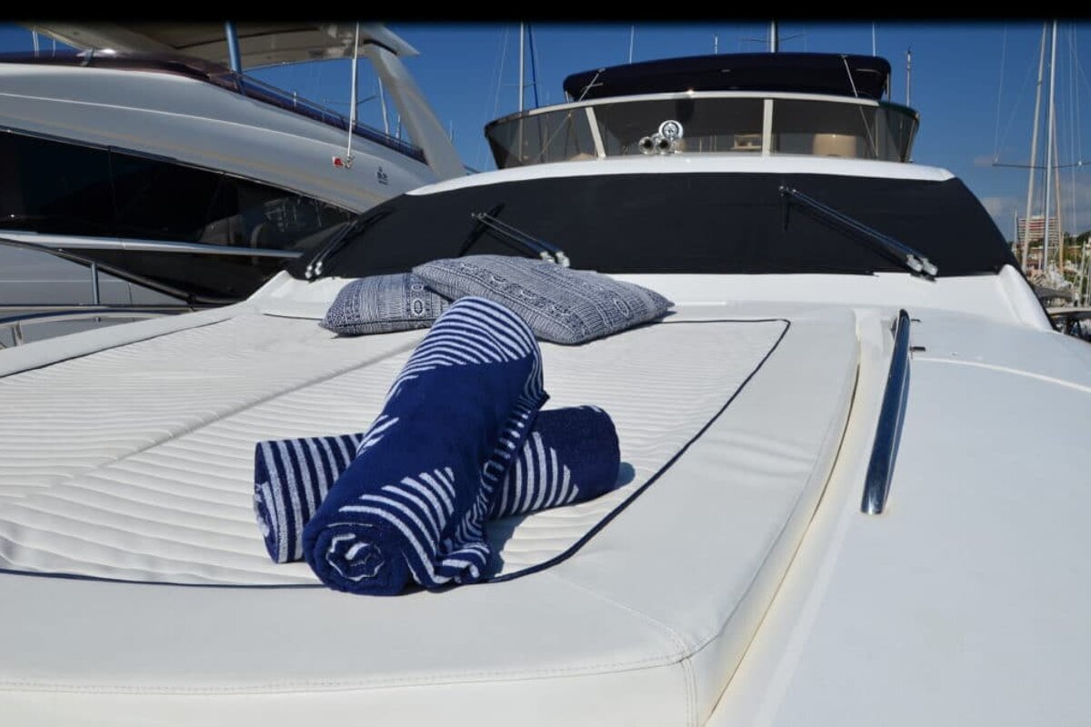 A boat with a volkswagen logo on the windshield