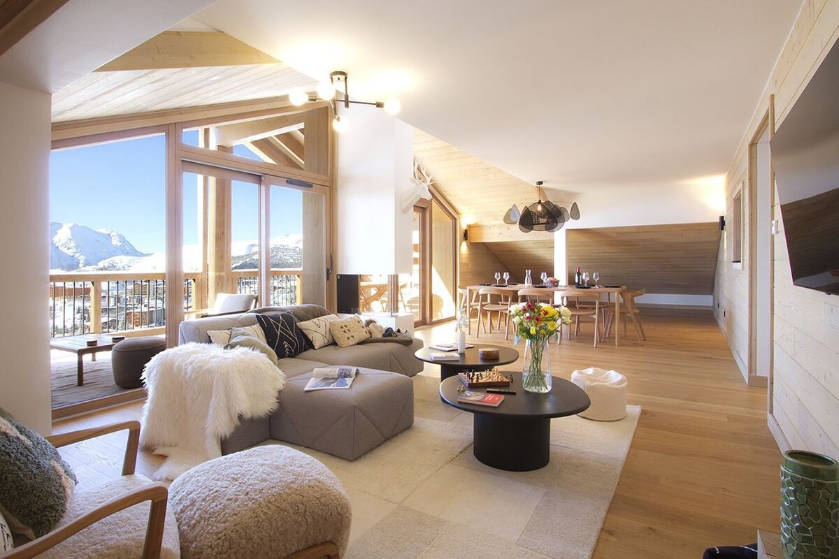 A living room with a couch and a table