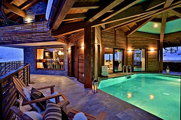 A large swimming pool in the middle of a house