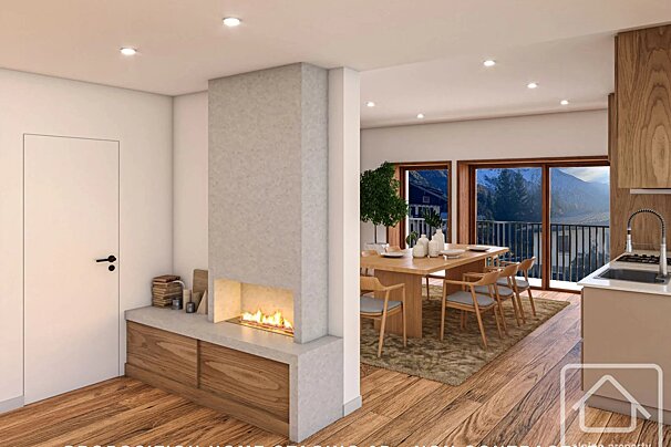 Modern apartment interior featuring a sleek concrete fireplace, wooden dining set, and large glass doors showcasing scenic mountain views.
