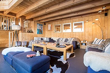 A living room with a couch and a coffee table