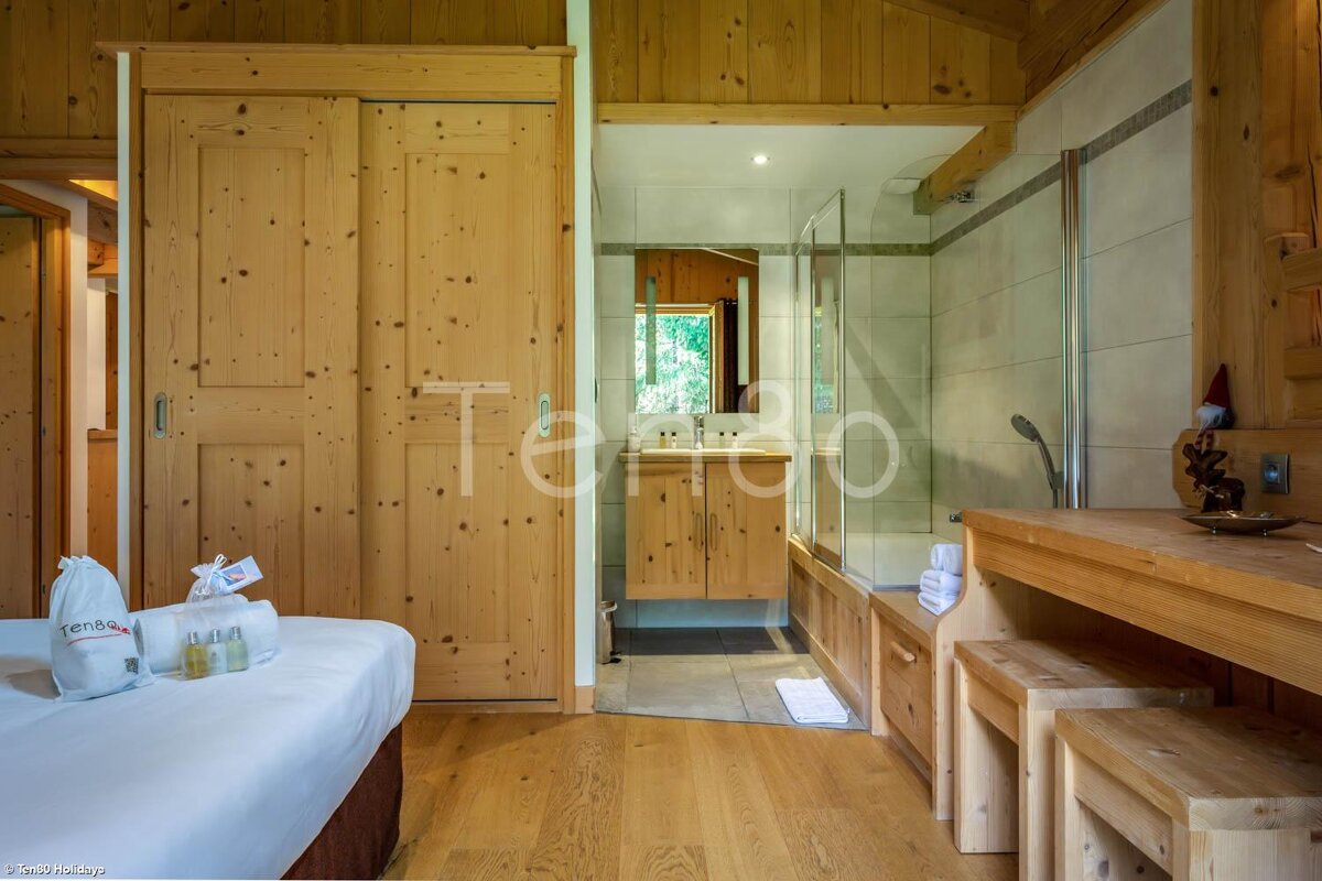 A bathroom with the word tango on the wall