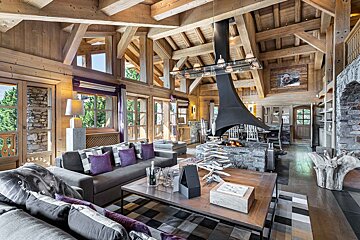 A living room filled with furniture and a fireplace