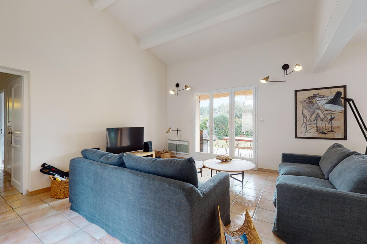 A living room with a couch and a television
