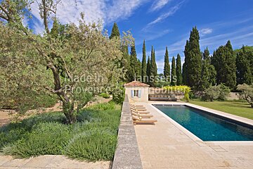 A large swimming pool with the words made in janssens provence written on the bottom