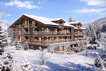A large, multi-story wooden chalet with a snow-covered roof in a snowy mountain landscape.