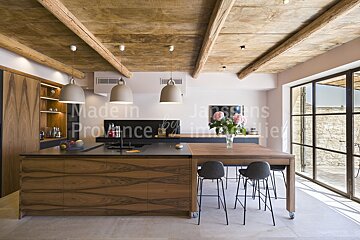 A kitchen with the words made in provence on the wall