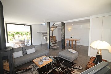 A living room with a couch and a table