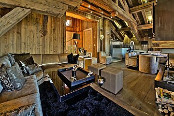 A living room with a couch and a coffee table