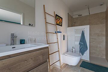 A bathroom with the words made in provence on the wall