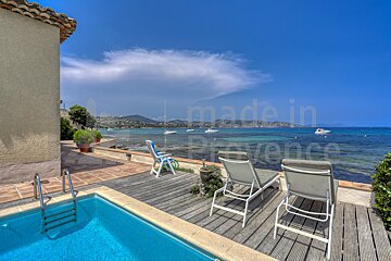 A swimming pool with the words made in provence on the bottom