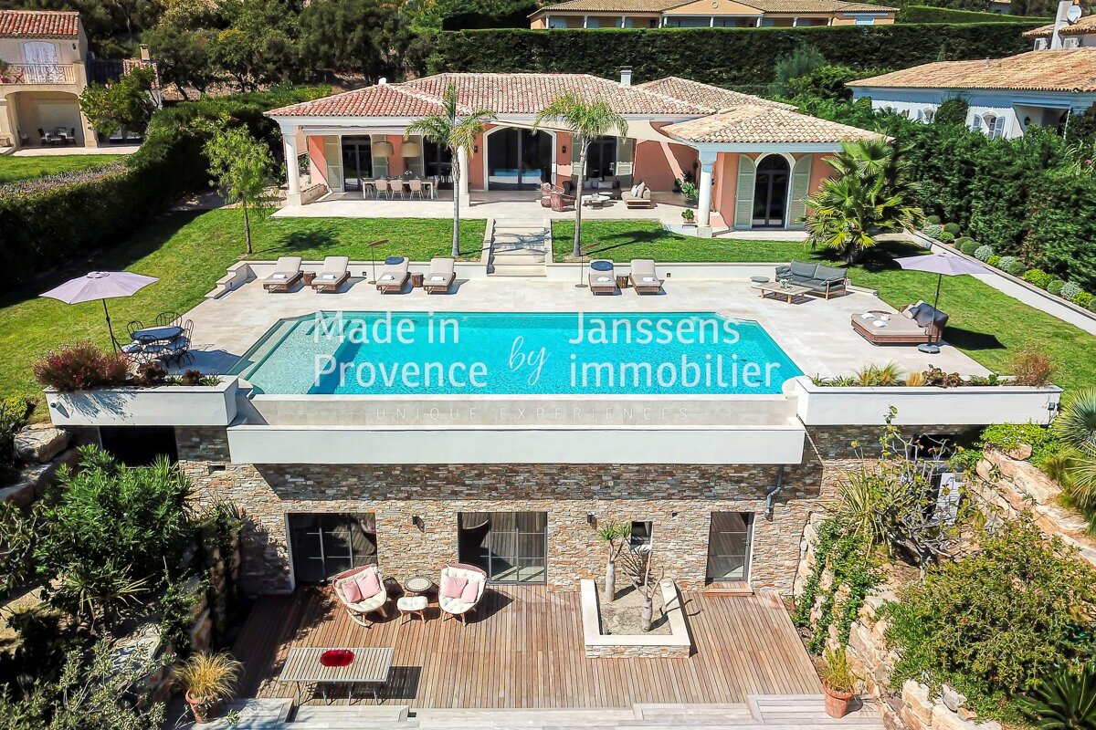 An aerial view of a house with the words made in provence by immobilier
