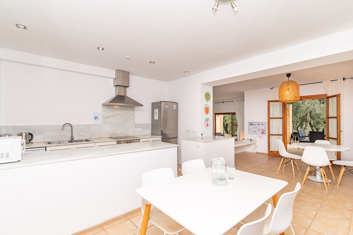 A kitchen with a refrigerator that says lg on it