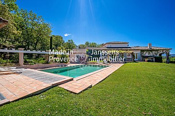 A large house with a large swimming pool is for sale by janssens immobilier