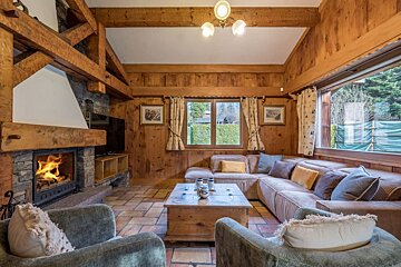 A living room filled with furniture and a fireplace