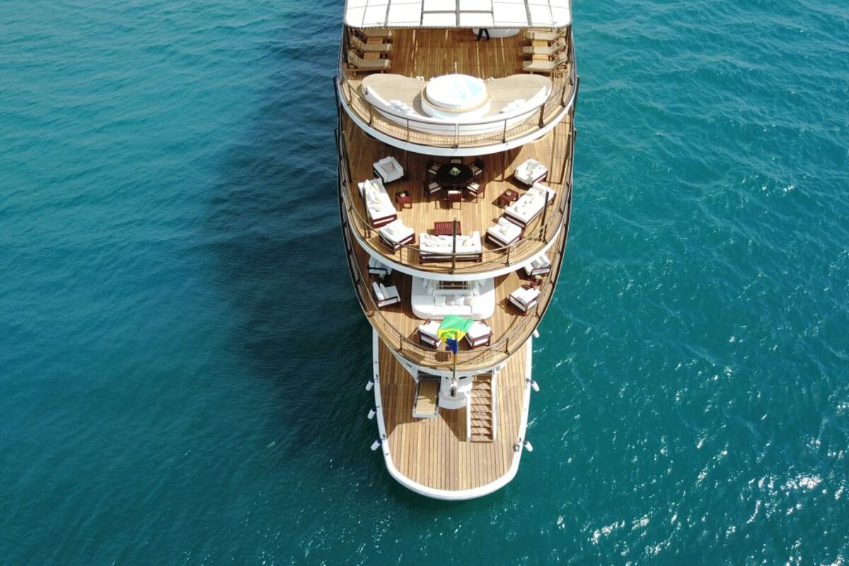 An aerial view of a large yacht in the ocean