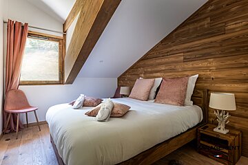 A balcony with a table and chairs and a sign that says rent designer