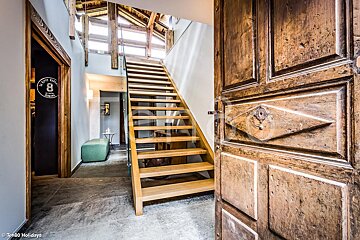 A wooden staircase with the number 8 on it