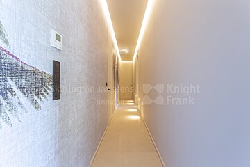 A hallway with knight frank written on the wall