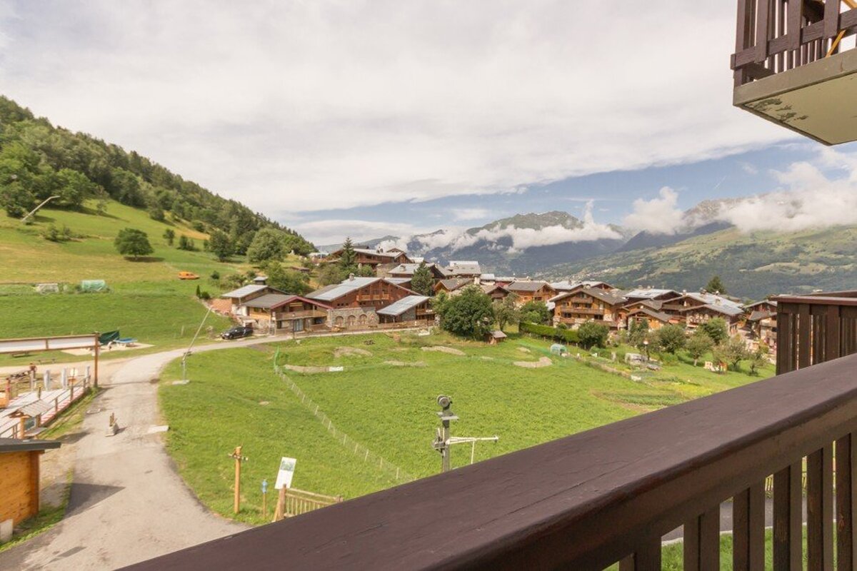 A view of a mountain village from a balcony
