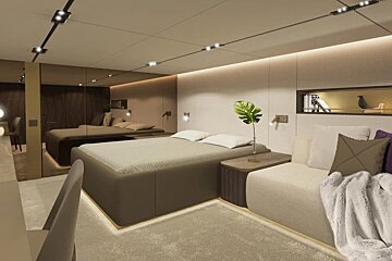 A bedroom with a large bed and a couch