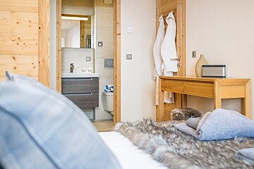 A bathroom with a sink and a toilet in it