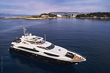 An aerial view of a large yacht in the ocean