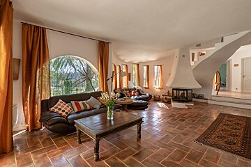 A living room with a couch and a coffee table