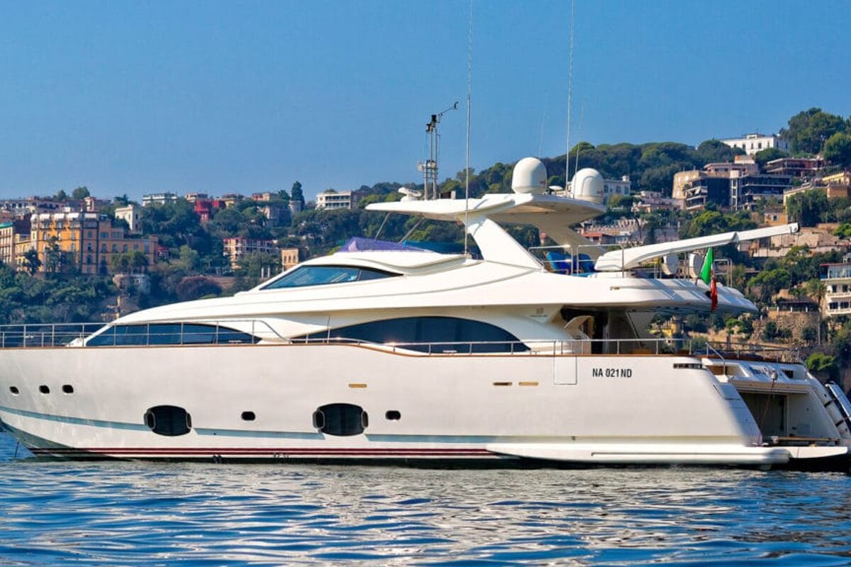 A large white yacht with the number ma 82110 on the side