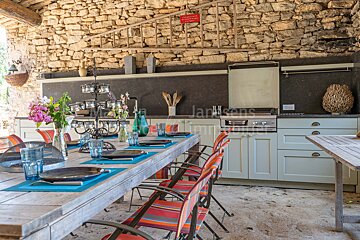 A kitchen with a sign that says jenkins on it