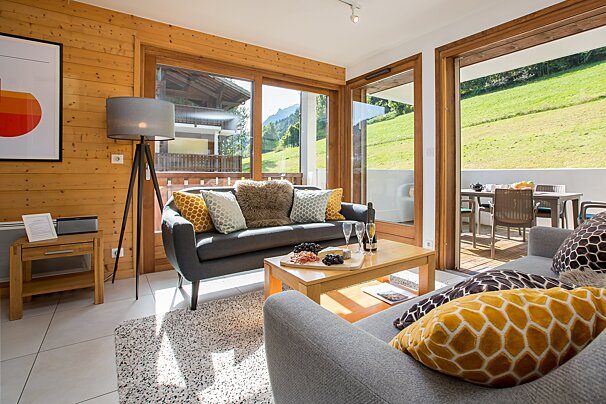 A living room with a couch and a coffee table