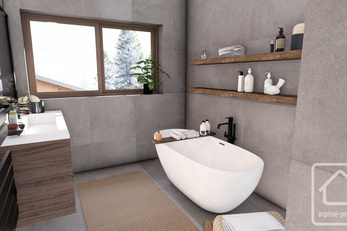 Modern bathroom with a white freestanding tub, concrete-look walls, floating wooden shelves, and a window with a snowy view.