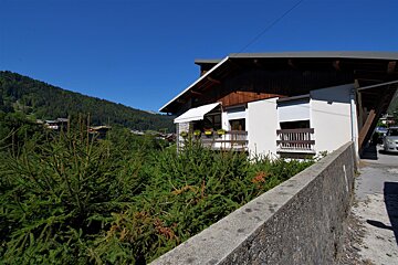 A house with a white awning on the front of it