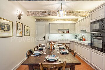 A kitchen with the word provence on the wall