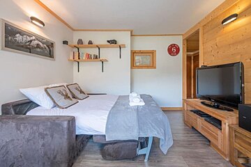 The number 6 is on the wall above the bed