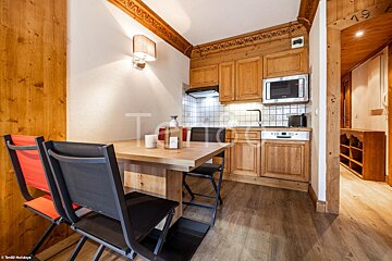 A small kitchen with the number 49 on the wall