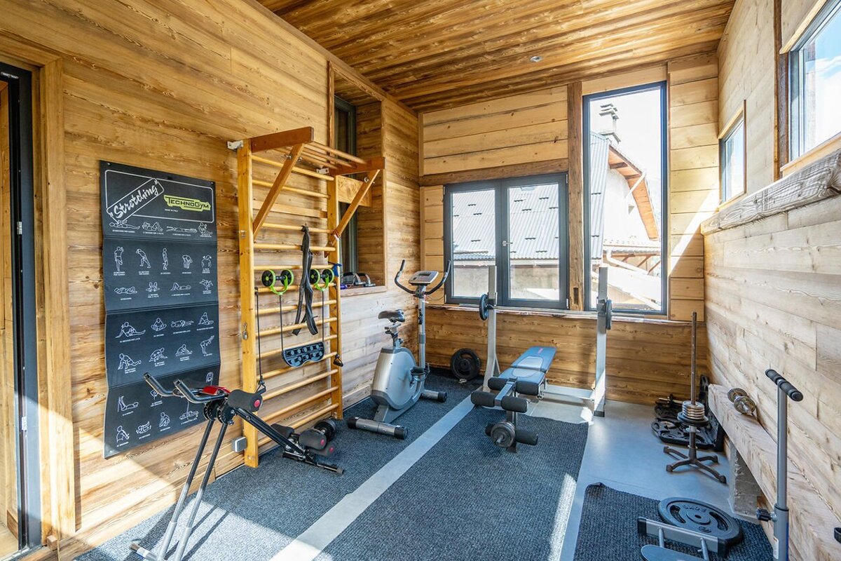 A gym with a sign that says ' stretching ' on it