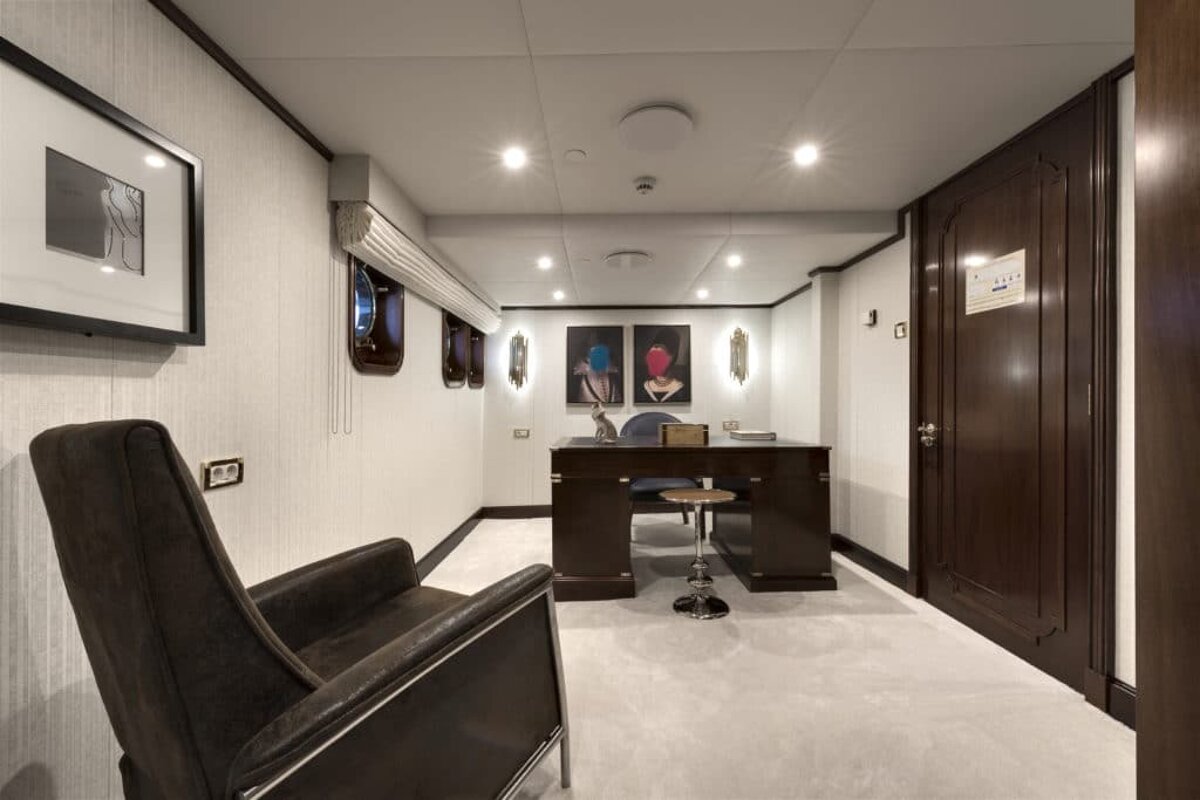 A room with a sign on the door that says ' a ' on it