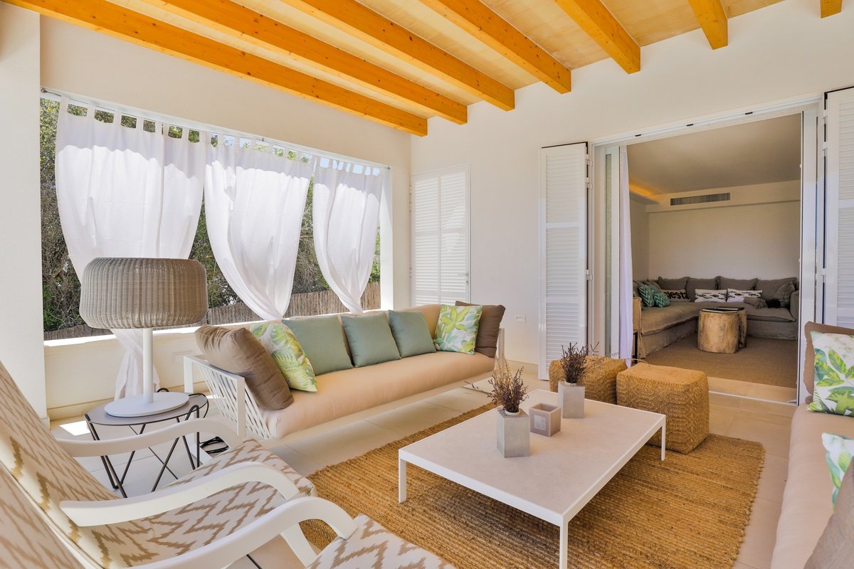 A living room with a couch and a coffee table