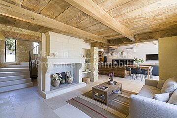 A living room with a fireplace made in provence