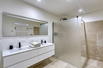 A bathroom with the word provence on the wall