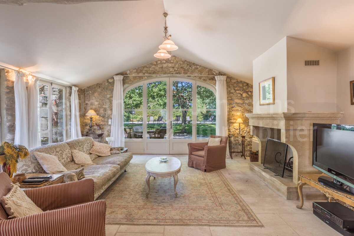 A living room with a fireplace and a couch