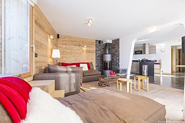 A living room with a couch and a coffee table