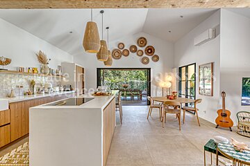 A kitchen with the word made in provence on the bottom