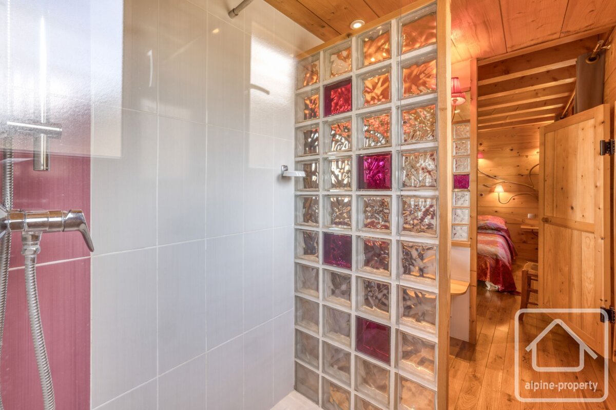 A picture of a bathroom taken by alpine-property